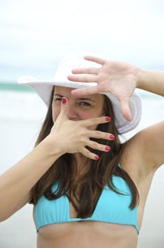 Woman enjoying the beach in Porto de Galinhas, Pernambuco, Brazil