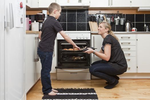 Mother and son in a kitchen situation