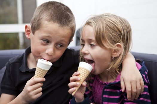 Happy Siblings eating ice-cream