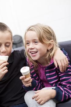 Siblings eating Ice-Cream