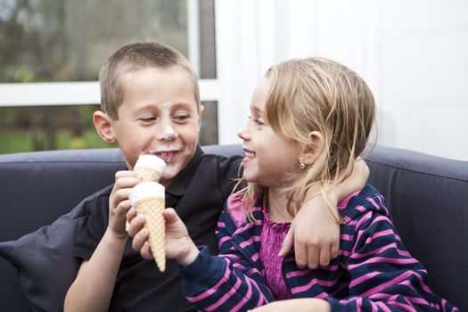 Happy Siblings eating ice-cream
