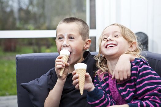 Happy Siblings eating ice-cream