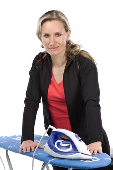 Young women with iron on white background