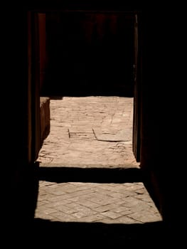 Looking through the door on the old, monastery courtyard