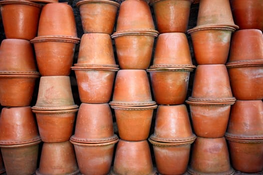 A background of red clay pots for gardens.