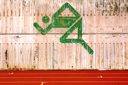running track and a logo on the wall