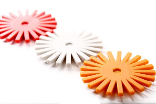 plastic gear wheel on white.