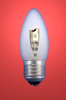 The burning dollar in a light bulb