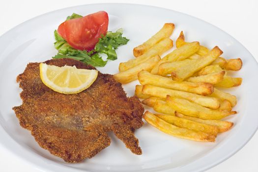 detail of a viennese schnitzel on a plate