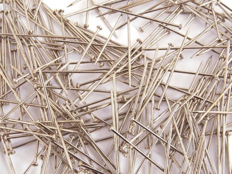 Pin used when sewing on a plain white background.