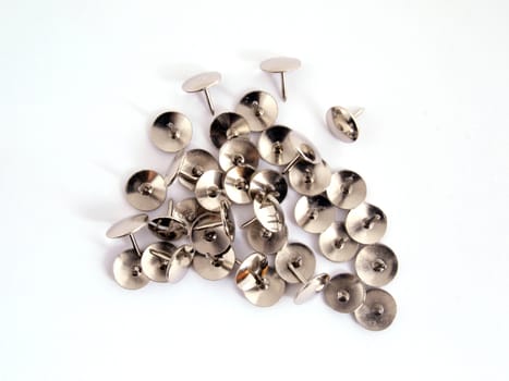 Thumb tack or drawing pin on a plain white background.