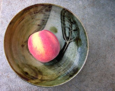 A delightful peach just before you eat it