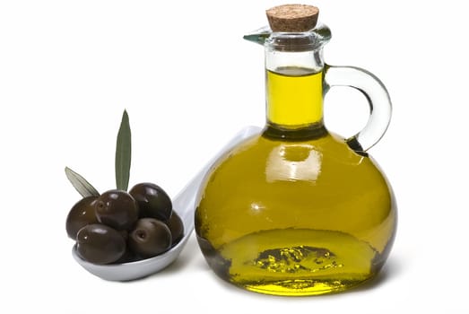 Olive oil bottles and olives isolated on a white background.