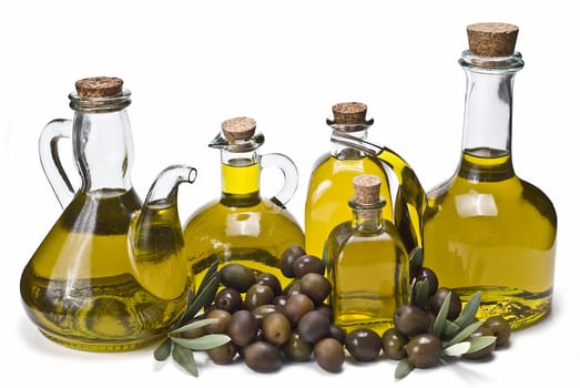 Olive oil bottles and olives isolated on a white background.