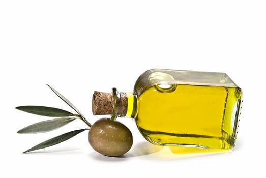 Olive oil bottles and olives isolated on a white background.