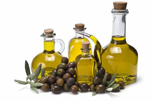 Olive oil bottles and olives isolated on a white background.