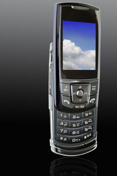 Latest Mobile Phone Sleek with clouds in lcd display