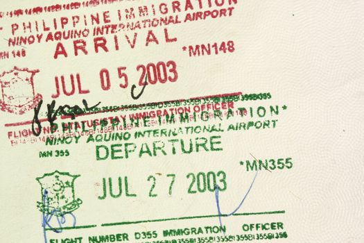 Arrival Departure visa stamps in a philippine passport