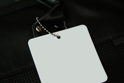 close-up of a Sale tag against black- no copyright infringement