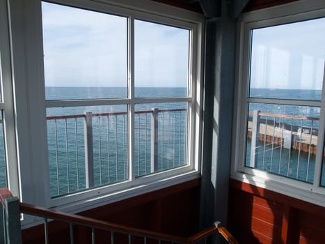 Looking through a window to a beautiful sea ocean landscape
