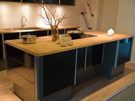 Modern clean design trendy kitchen made of black wooden elements 