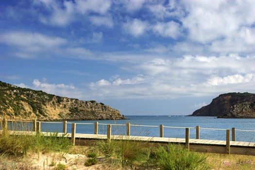 Picture of a Wood bridge crossing the beach