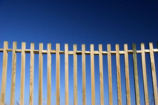 Beautiful wood fences over a great blue sky