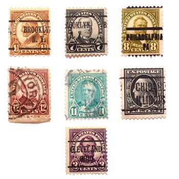Stamps of seven US presidents: Abraham Lincoln, George Washington, William Harding, William McKinley, Rutherford Haynes, Ulysses Grant, and Groover Cleveland