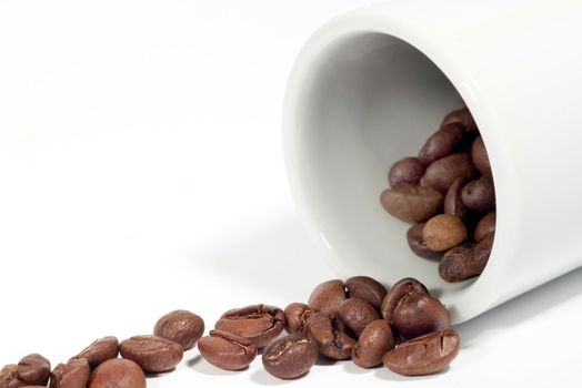 Coffee background: Close-up of a beans, cup