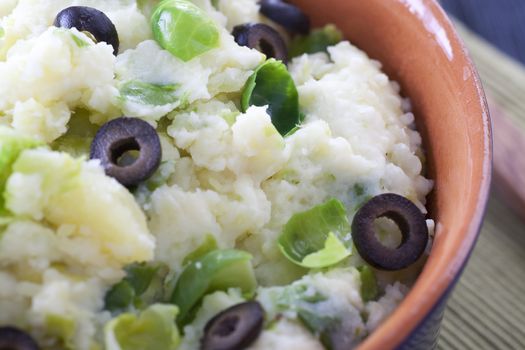 Dutch stamppot (gourmet mashed potatoes) with brussel sprouts and olives.  mmm lekker!