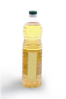 A bottle of light colored vegetable oil with blank label -  clipping path included