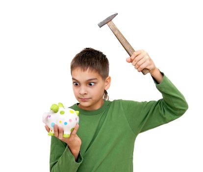 teenage boy breaking piggy money box isolated on white