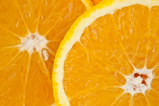 Close up of two fresh orange slices.