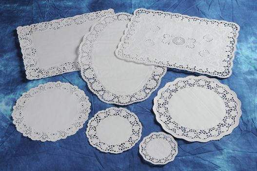 A set of disposable paper coasters under ware