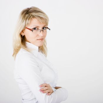 young business woman with glasses on a white background
