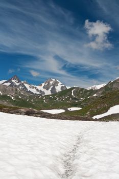 beautiful landscape from Pointe Rousse pass, Aosta valley, Italy with Mont Blanc massif on background