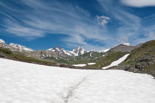 beautiful landscape from Pointe Rousse pass, Aosta valley, Italy with Mont Blanc massif on background