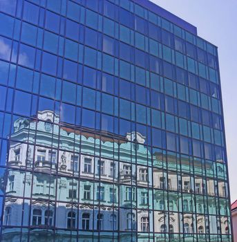 Ancient Building reflected in Modern one , Prague, Czech Republic