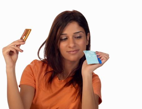 Girl weighing eighing up different choices for contraception