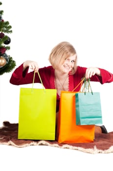 Beautiful woman with shopping bags isolated onwhite