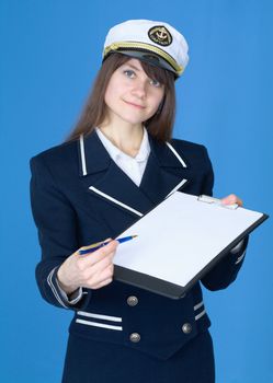Woman in sea uniform with tablet and pen on blue