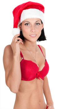 Portrait of beautiful woman in red santa hatisolated on white