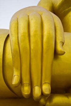 Closeup Hand of the Buddha in Temple of Thailand