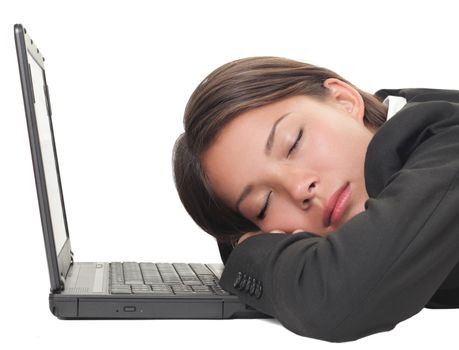 Woman sleeping on laptop taking a power nap during work. Isolated on white background.