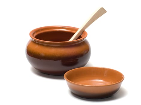 Brown ceramic ware on a white background.