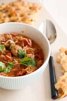 One pot meal with rice, meatloaf and tomatoes