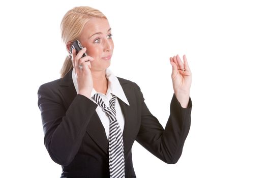 Businesswoman looking very unconvinced while talking on the phone