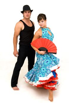 young dancing couple posing wearing black red and blue clothing and female holding a red open chinese fan