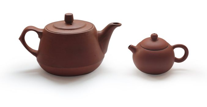 Clay teapots isolated on white background