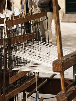 Detail of a medieval loom or carpet weaving machine